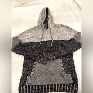 A grey “Trash Nouveau” women’s jacket